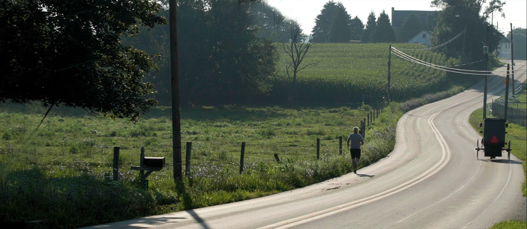 Jonathan on a morning run past the former Amish school site.